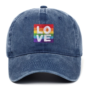 Distressed navy blue baseball cap with rainbow LOVE heart embroidery on front