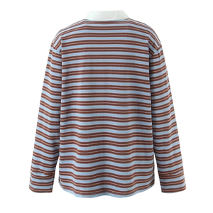 Detail view of the back of a blue and brown striped polo shirt with a white collar