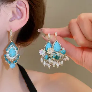 Bohemian silver needle drop turquoise and pearl fringe earrings in gold tone setting