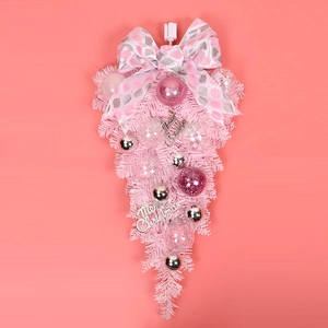 Pink Christmas teardrop swag with velvet bows and silver glitter ornaments decoration