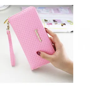 Pink cross-grain leather women's wallet with gold lettering and a detachable wrist strap