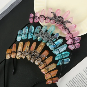 Detailed macro of handmade crystal crown headbands with triple moon alloy totem details