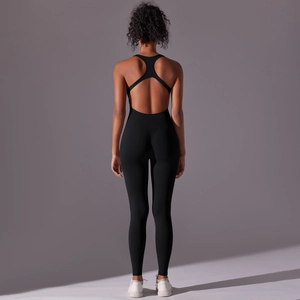 Close-up of the Y-shaped cross back straps on this seamless black yoga jumpsuit