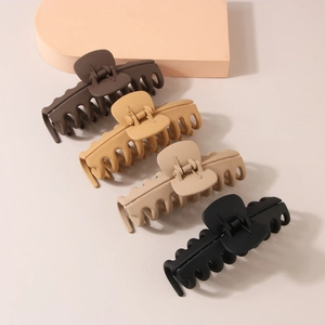 Set of 4 large matte hair claws in brown, khaki, beige, and black colors for thick hair