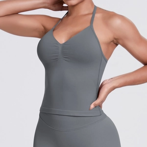 Detailed texture of seamless gray yoga top with stylish ruching and v-neck design