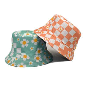 Daisy print and checkerboard sun hats in mint green and orange summer styles