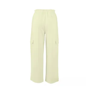 Detailed close-up of cream cotton linen cargo pants showing elastic drawstring waist and side pockets