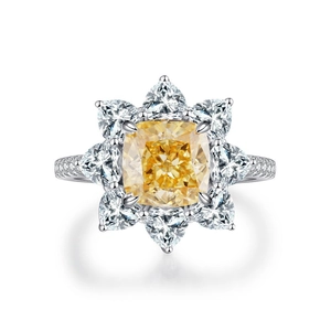 Luxurious yellow sunflower ring with a cushion-cut center stone in polished silver band