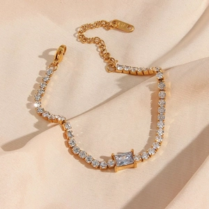 Detail of 18K gold plated tennis bracelet with square zircon and K18 hallmark engraving
