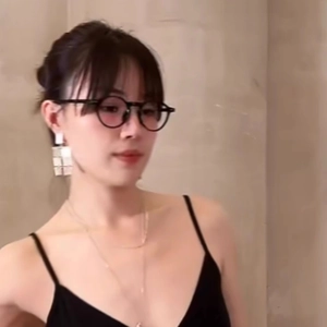 Silver geometric rectangular fringe earrings shown on model with minimalist style