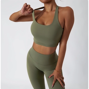 Olive green yoga set featuring a racerback sports bra and high-waist seamless leggings