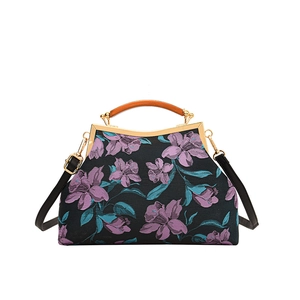 Vintage style black embroidered handbag with purple 3D flowers and gold metal frame