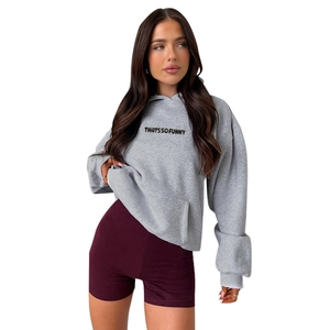 Detail of grey printed oversized hoodie featuring the THATSSOFUNNY slogan in bold text