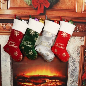 Set of 4 Christmas stockings with Merry Christmas gold foil text and velvet fabric