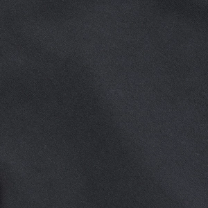 Macro shot of high-quality black textile fabric with a sharp twill weaving structure