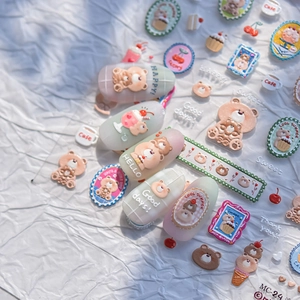 Detail of 3D bear and coffee cafe themed nail art stickers with matte texture