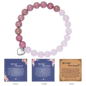 Detail of 8mm pink natural stone bracelet with heart pendant and friendship greeting cards