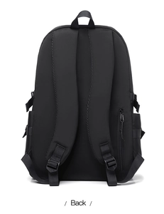 Detailed back view of a black backpack featuring S-shaped padded straps and hidden zipper
