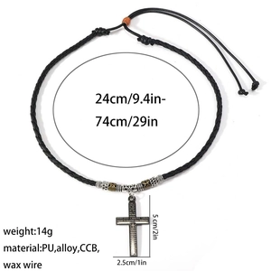 Detailed view of woven leather necklace with engraved cross pendant and size markings