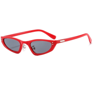 Vintage red cat eye sunglasses with narrow frame and dark grey lenses in 45-degree view