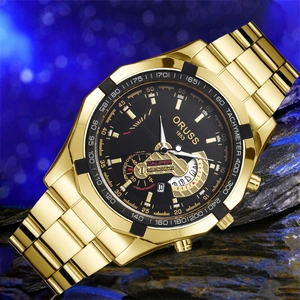 Golden business watch for men with black dial and luminous steel band on blue rock