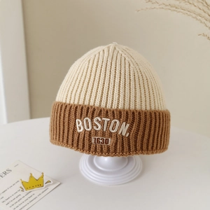Detailed view of the Boston 1630 letter embroidery on thick ribbed knit winter beanie hat
