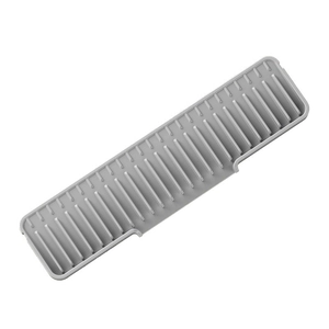 Kitchen faucet silicone splash guard with sloped drainage channels in minimalist grey