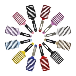 Set of colorful boar bristle curved vent brushes for hair styling in 12 vibrant colors