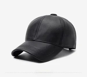 Detail of black faux leather baseball cap showing high-quality lychee grain texture