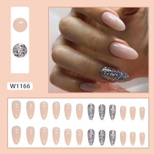 Nude pink almond fake nails set with silver glitter accents and 24 piece nail tips