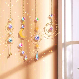 Hanging sun catcher set with golden moon and sun frames and colorful crystal prisms