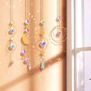 Hanging sun catcher set with golden moon and sun frames and colorful crystal prisms