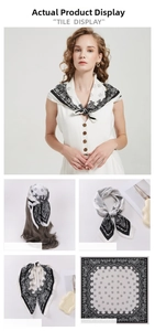 Detail view of a black and white paisley silk scarf shown tied and as a headband