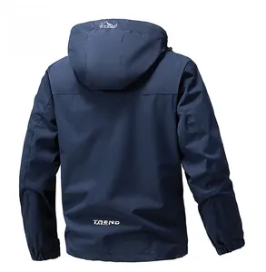 Back view of a navy outdoor hooded jacket with TREND print and mountain logo