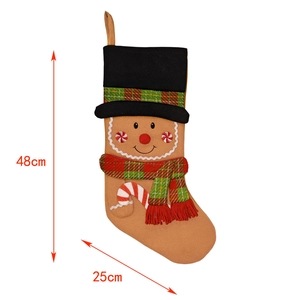 Detail showing gingerbread man Christmas stocking with dimensions 48cm height and 25cm width