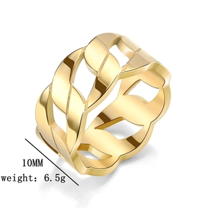 Close-up of a gold-plated titanium steel ring featuring a wide hollow-out chain link design.