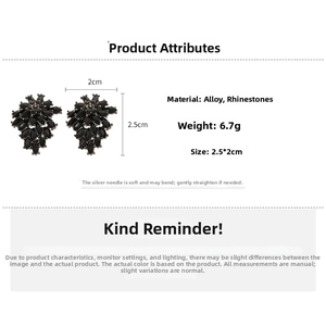 Detail view of black rhinestone cluster earrings with size measurements 2.5x2cm