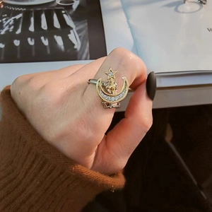 Adjustable spinning star and moon ring for women with cubic zirconia in gold and silver