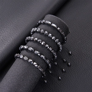 Close-up of magnetic hematite beaded bracelets with various irregular shapes and metallic luster