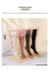 Detailed view of bamboo jewelry display stands with velvet lining in four colors