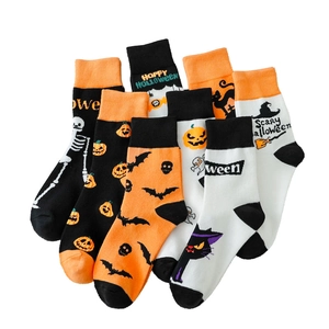 Halloween crew socks set with pumpkin, skull, and bat motifs in black, white, and orange