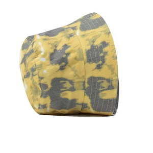 Close-up of yellow and grey tie-dye canvas bucket hat showing fabric texture