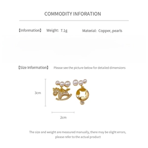 Détail des boucles d'oreilles poney asymétriques avec dimensions 3cm de haut
