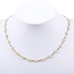 18K gold plated stainless steel daisy flower necklace on a white model bust
