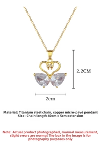 Detail of swan heart pendant with white zircon inlays and adjustable steel chain