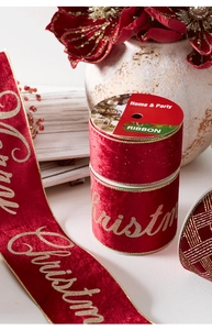 Detail of red velvet Christmas ribbon with gold lettering and wire-edged finish