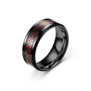 Close-up of black stainless steel ring with red dragon carbon fiber inlay