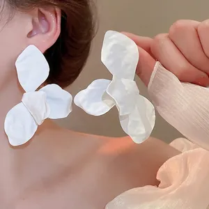 Exaggerated large white matte flower earrings with irregular layered petals for women