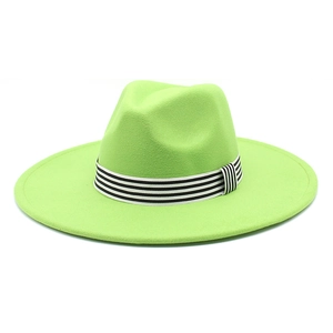 Detail of lime green wool felt fedora with black and white striped grosgrain ribbon trim