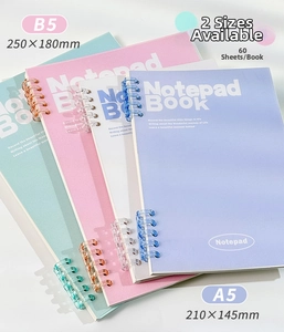 Detail of colorful B5 and A5 spiral notebooks with pastel covers and 60 inner sheets